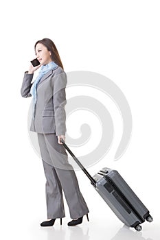 Asian business woman holding a suitcase