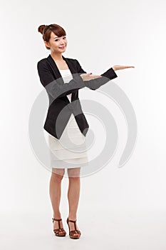 Asian business woman indicate blank space.