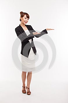 Asian business woman indicate blank space. photo