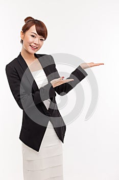 Asian business woman indicate blank space. photo