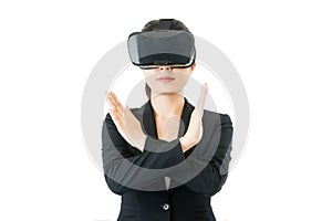 Asian business woman. reject sign by VR headset glasses