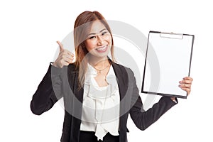 Asian business woman show thumbs up and blank clipboard