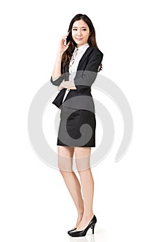 Asian business woman talking on cell phone