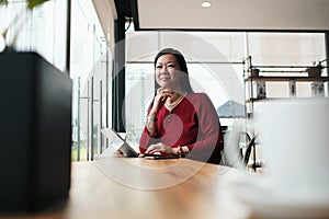 Asian Business Woman Working In Bar Outside Office