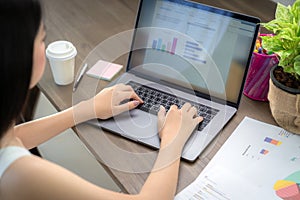 Asian business woman working in home office