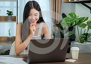 Asian business woman working in home office