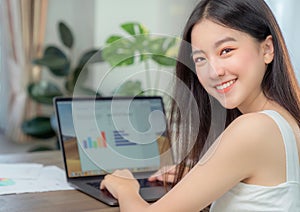 Asian business woman working in home office