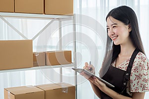 Asian business woman working in home office