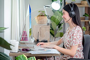 Asian business woman working in home office