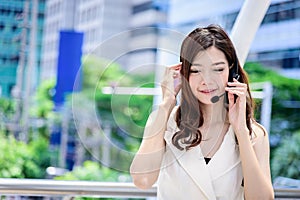 The asian business woman working and operation in outside office