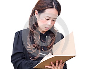 Asian business woman writing on brown book over white isolate ba