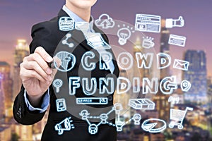 Asian business woman is writing crowdfunding idea concept.