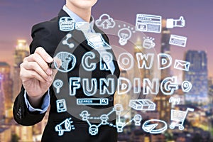 Asian business woman is writing crowdfunding idea concept. photo