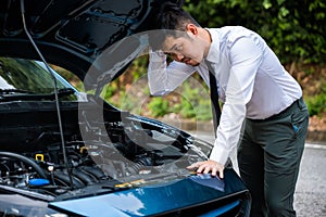 Asian businessman car broken breakdown