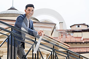 Asian businessman enjoying the weather