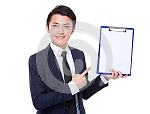Asian businessman finger point to clipboard