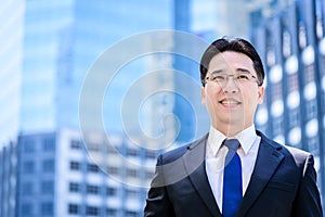 The asian businessman has thinking of vision with building and c