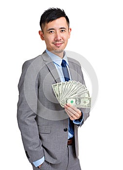 Asian businessman hold with cash