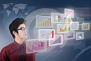 Businessman looking chart