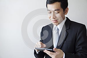 Asian businessman with smart phone