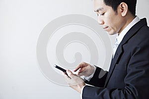 Asian businessman with smart phone