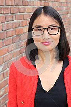 Asian businesswoman with glasses close up