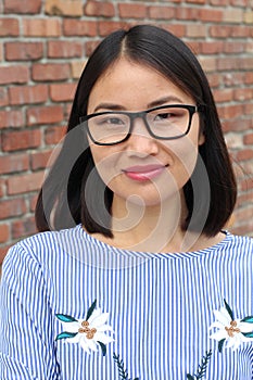 Asian businesswoman with glasses close up