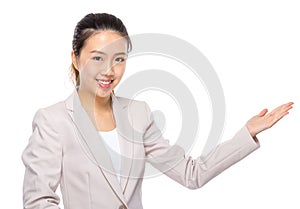 Asian businesswoman with hand presentation