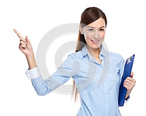 Asian businesswoman hold clipboard finger up