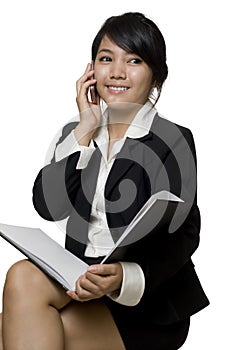 Asian businesswoman talking on the telephone