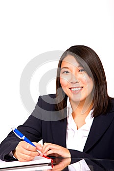 Asian businesswoman writing