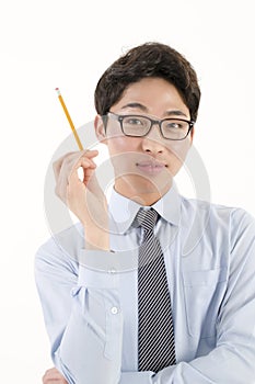 Asian bussinessman with a pencil