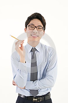 Asian bussinessman with a pencil