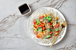 Asian cashew chicken on a white marble background