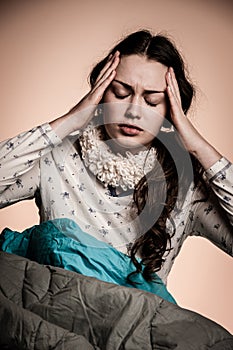 Asian caucasian woman having a head ache - girl with pain in hea