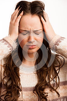 Asian caucasian woman having a head ache - girl with pain in hea