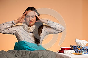 Asian caucasian woman having a head ache - girl with pain in hea