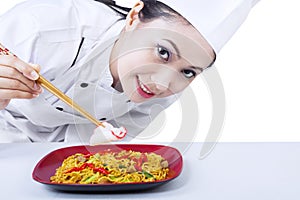 Asian chef cook noodle - isolated