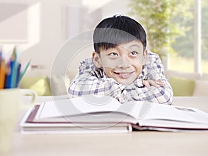 Asian child daydreaming