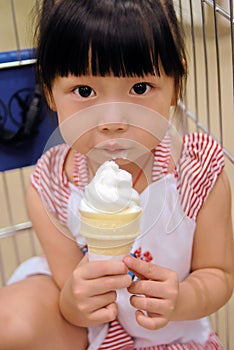 Asian child eating Ice cream