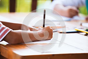 Asian child girl drawing and painting with her friend