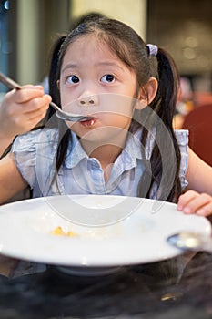 Asian Child, Girl, Sipping Soup