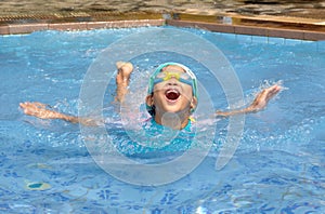 Asian child practice swimming