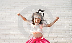 asian Child preschooler with face painting. Make up.