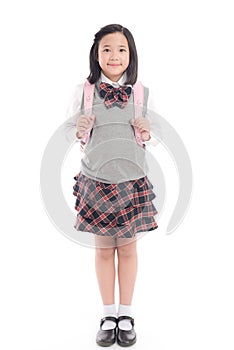 Asian child in school uniform with pink school bag on