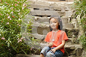 Asian child sitting