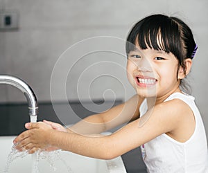 Asian Child Washing Hands