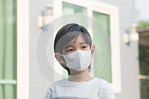 Asian child wearing face mask