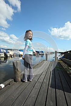 Asian child in the wharf photo