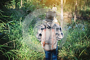 Asian children walking in forest , Relax time on holiday